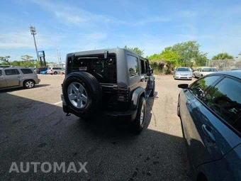 2014 Jeep Wrangler Unlimited Sport - miniatura 3
