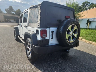 2014 Jeep Wrangler Unlimited Sport - miniatura 12