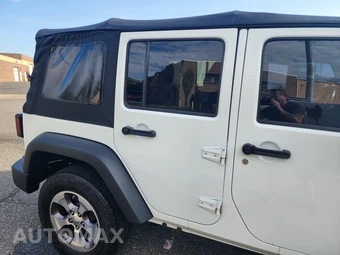 2014 Jeep Wrangler Unlimited Sport - miniatura 5