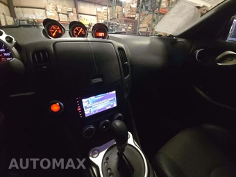 2014 Nissan 370Z Touring Convertible - miniatura 7