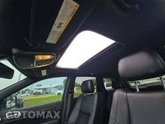 2015 Jeep Grand Cherokee Altitude Edition - miniatura 12