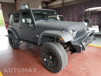2015 Jeep Wrangler Unlimited Freedom Edition - miniatura 3