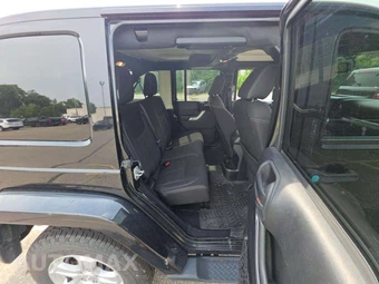 2015 Jeep Wrangler Unlimited Sahara - miniatura 13