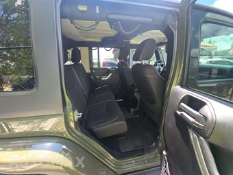2015 Jeep Wrangler Unlimited Sahara - miniatura 16