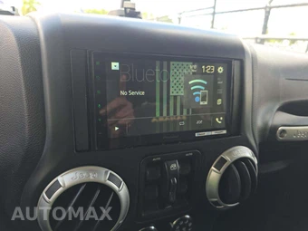 2015 Jeep Wrangler Unlimited Sahara - miniatura 31