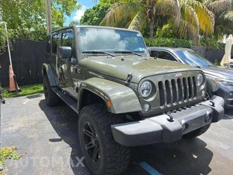 2015 Jeep Wrangler Unlimited Sahara - miniatura 4