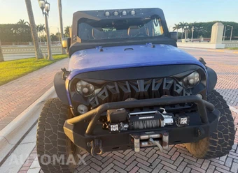 2015 Jeep Wrangler Unlimited Sahara - miniatura 3