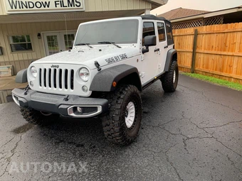 2015 Jeep Wrangler Unlimited Sahara - miniatura 3