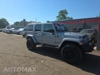 2015 Jeep Wrangler Unlimited Sahara - miniatura 3