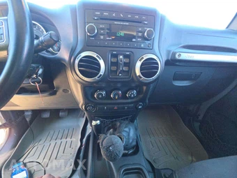 2015 Jeep Wrangler Unlimited Sahara - miniatura 10