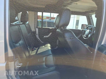 2015 Jeep Wrangler Unlimited Sahara - miniatura 16