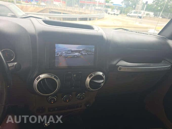 2015 Jeep Wrangler Unlimited Sahara - miniatura 10