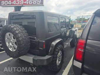 2015 Jeep Wrangler Unlimited Sahara - miniatura 3