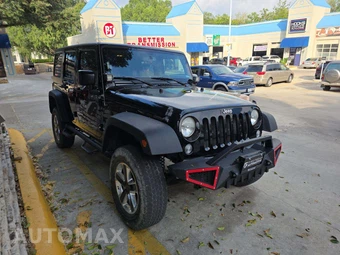 2015 Jeep Wrangler Unlimited Sport - miniatura 4