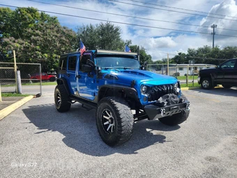 2015 Jeep Wrangler Unlimited Sport - miniatura 3