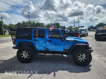 2015 Jeep Wrangler Unlimited Sport - miniatura 4