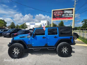2015 Jeep Wrangler Unlimited Sport - miniatura 7