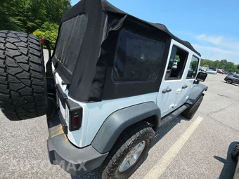 2015 Jeep Wrangler Unlimited Sport - miniatura 4