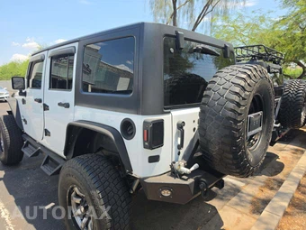 2015 Jeep Wrangler Unlimited Sport - miniatura 2