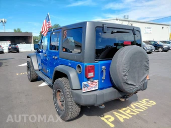 2015 Jeep Wrangler Unlimited Sport - miniatura 3
