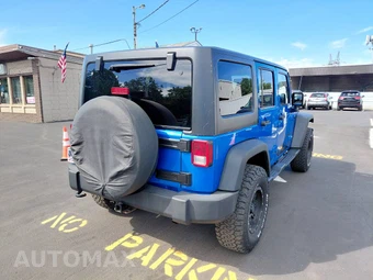 2015 Jeep Wrangler Unlimited Sport - miniatura 4
