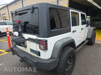 2015 Jeep Wrangler Unlimited Sport - miniatura 4
