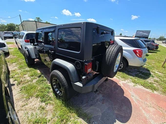 2015 Jeep Wrangler Unlimited Sport - miniatura 2