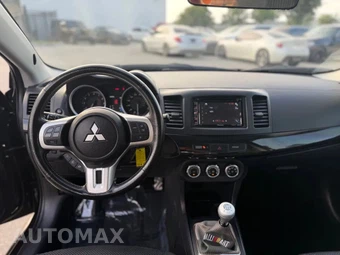 2015 Mitsubishi Lancer Evolution GSR - miniatura 15