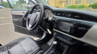2015 Toyota Corolla LE - miniatura 25