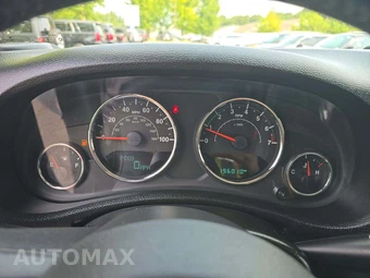 2016 Jeep Wrangler Sahara - miniatura 6