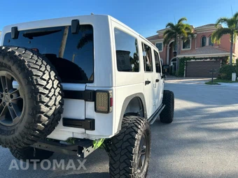 2016 Jeep Wrangler Unlimited Black Bear Edition - car from the USA, Manheim Buy-Now listing at AUTOMAX