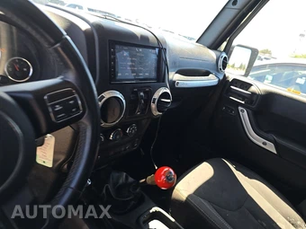 2016 Jeep Wrangler Unlimited Sahara - miniatura 11