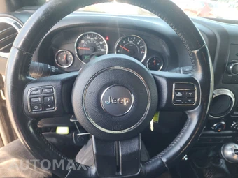 2016 Jeep Wrangler Unlimited Sahara - miniatura 10