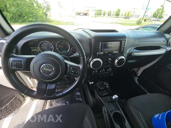 2016 Jeep Wrangler Unlimited Sahara - miniatura 10
