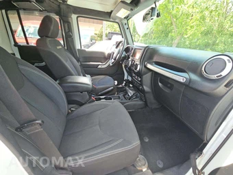 2016 Jeep Wrangler Unlimited Sahara - miniatura 18