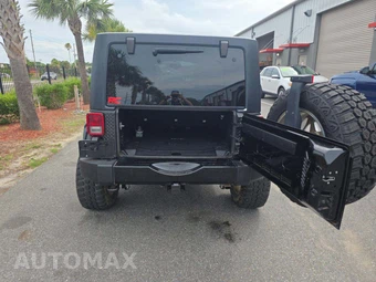 2016 Jeep Wrangler Unlimited Sahara - miniatura 14