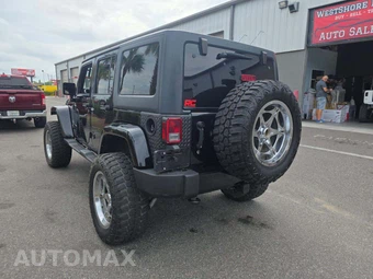 2016 Jeep Wrangler Unlimited Sahara - miniatura 2