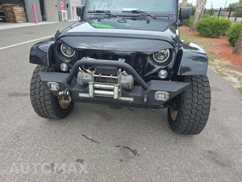 2016 Jeep Wrangler Unlimited Sahara - miniatura 24