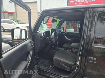 2016 Jeep Wrangler Unlimited Sahara - miniatura 6