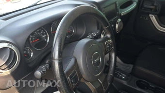 2016 Jeep Wrangler Unlimited Sahara - miniatura 24