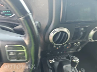 2016 Jeep Wrangler Unlimited Sahara - miniatura 11
