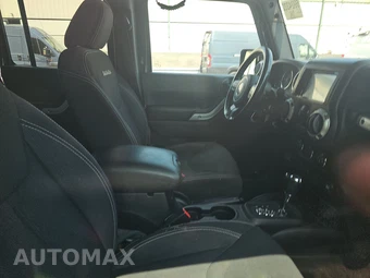 2016 Jeep Wrangler Unlimited Sahara - miniatura 8