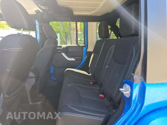 2016 Jeep Wrangler Unlimited Sahara - miniatura 13