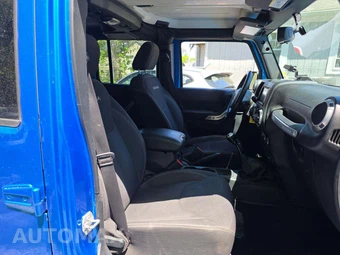 2016 Jeep Wrangler Unlimited Sahara - miniatura 18