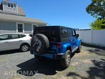 2016 Jeep Wrangler Unlimited Sahara - miniatura 3