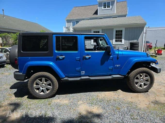 2016 Jeep Wrangler Unlimited Sahara - miniatura 4