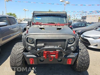 2016 Jeep Wrangler Unlimited Sahara - miniatura 2