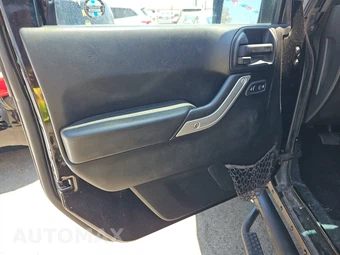2016 Jeep Wrangler Unlimited Sahara - miniatura 9