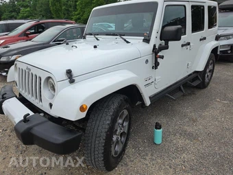 2016 Jeep Wrangler Unlimited Sahara - car from the USA, Manheim Buy-Now listing at AUTOMAX