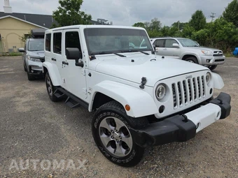 2016 Jeep Wrangler Unlimited Sahara - miniatura 3